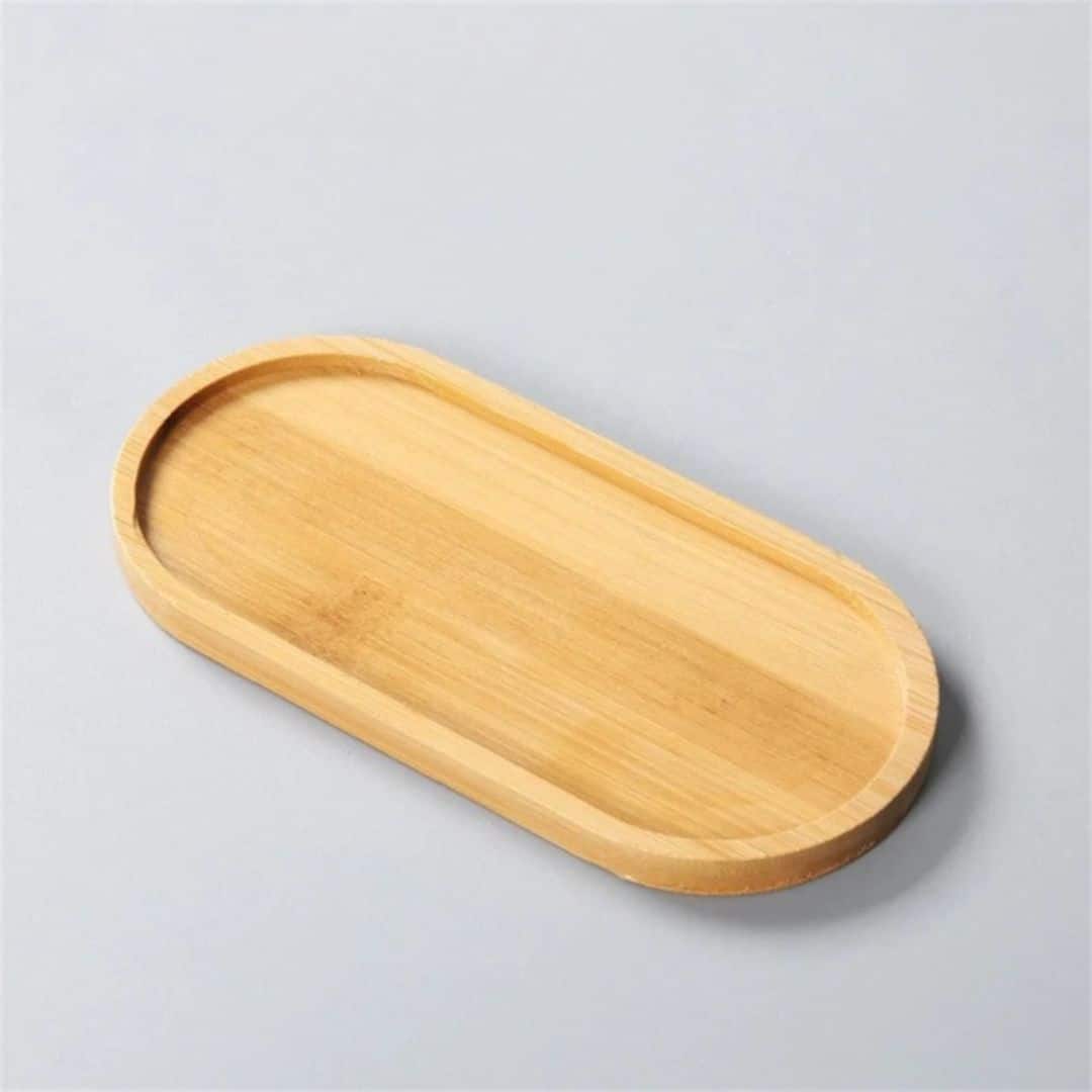 Long oval woven bamboo tray with slightly raised edges