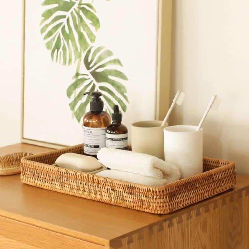 Square rattan tray with handwoven sides – shown in a room setting