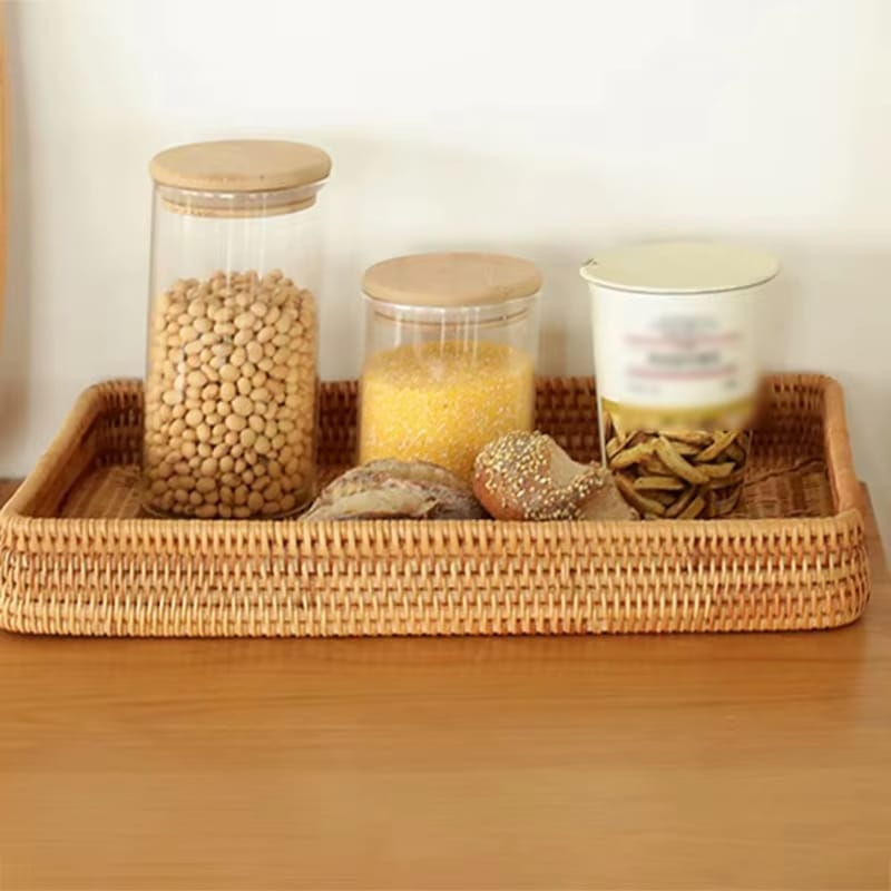 Round woven bamboo tray with a rattan look – shown in a room setting