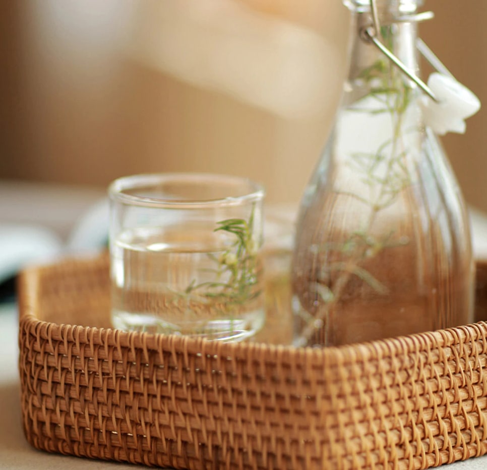 Hexagonal woven rattan tray with crisp angles – shown in a room setting (2)