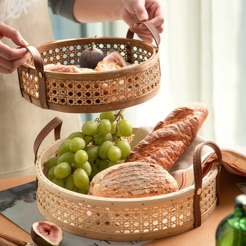Nordic handwoven rattan tray with integrated handles – shown in a room setting