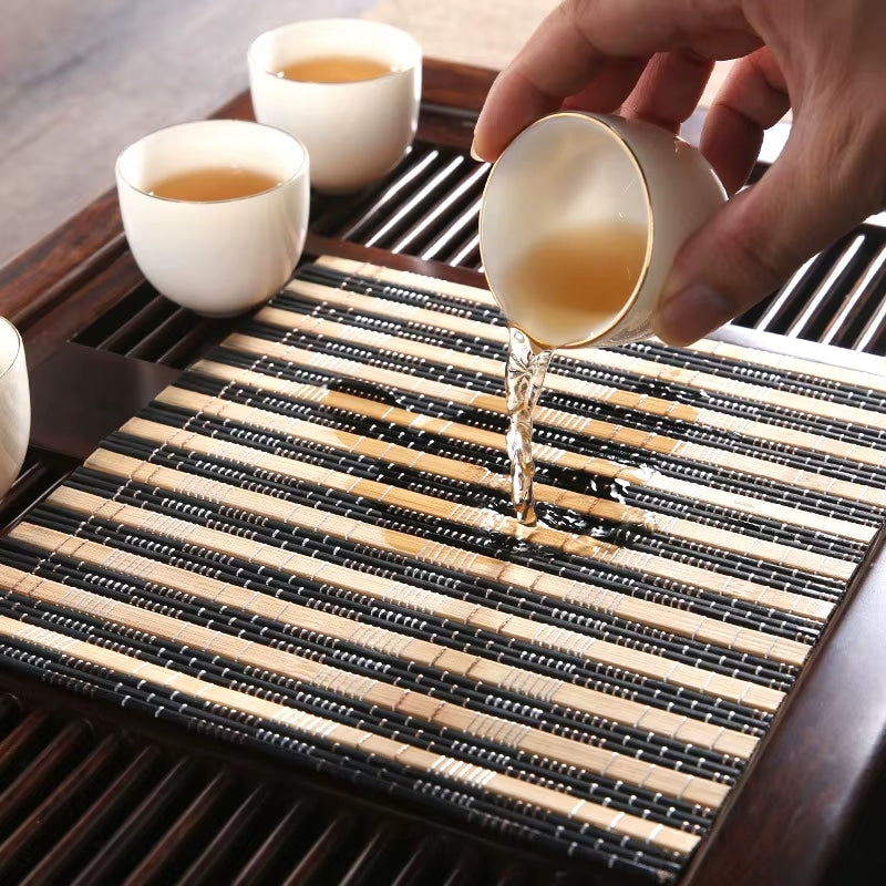 Rectangular beige and black bamboo placemat – shown in use