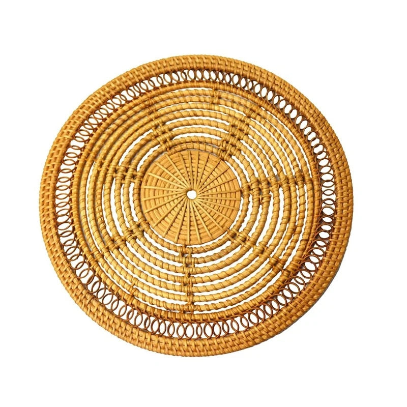 Round woven plastic rattan-look placemat