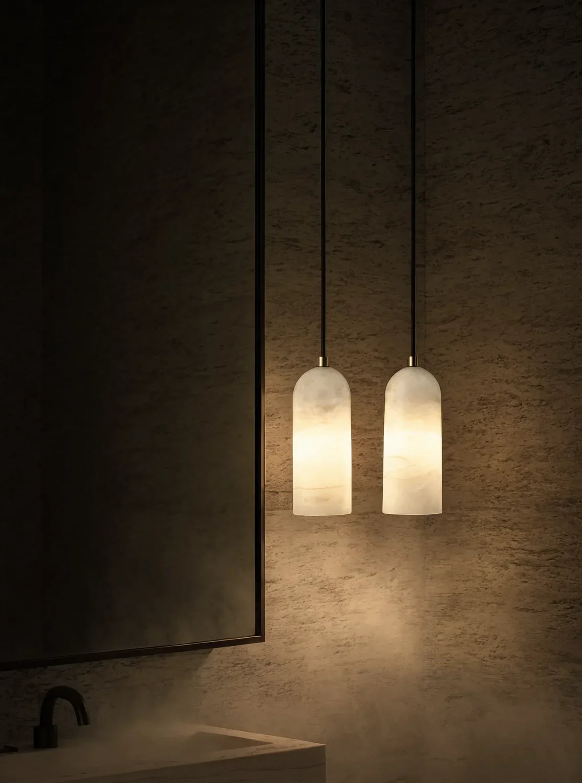 Tarente translucent marble pendant light with brushed brass canopy – shown in a bathroom