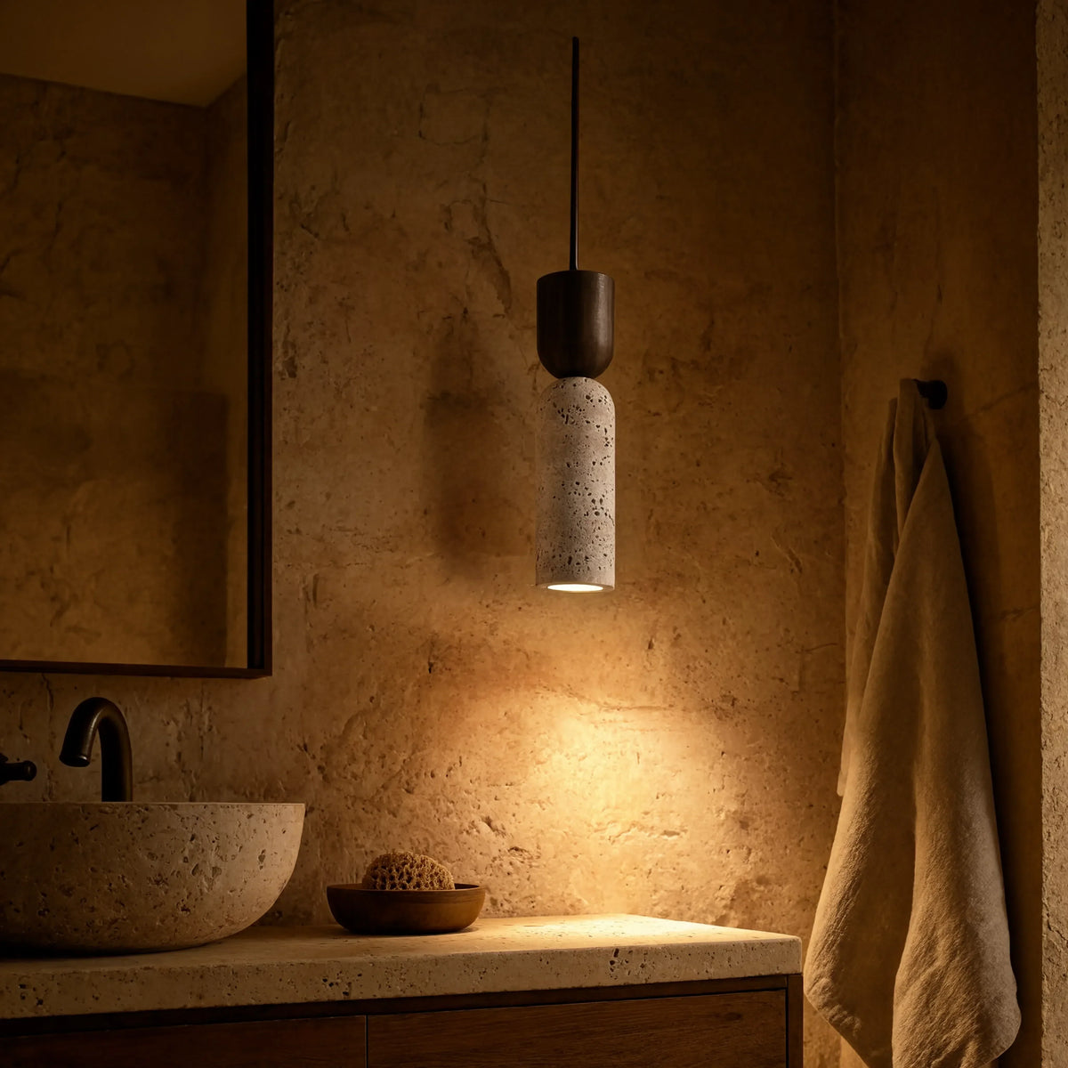 Ségeste narrow travertine and dark wood pendant light – shown in a bathroom