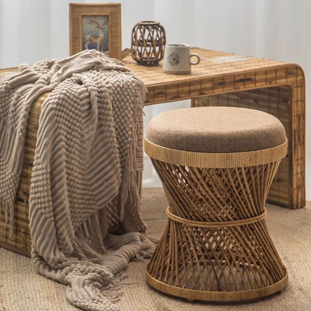 Japanese-style hourglass wicker stool with a cinched waist – brown variant, shown in a room setting