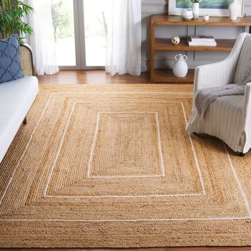 Modern rectangular wicker-look woven rug – shown in a room setting
