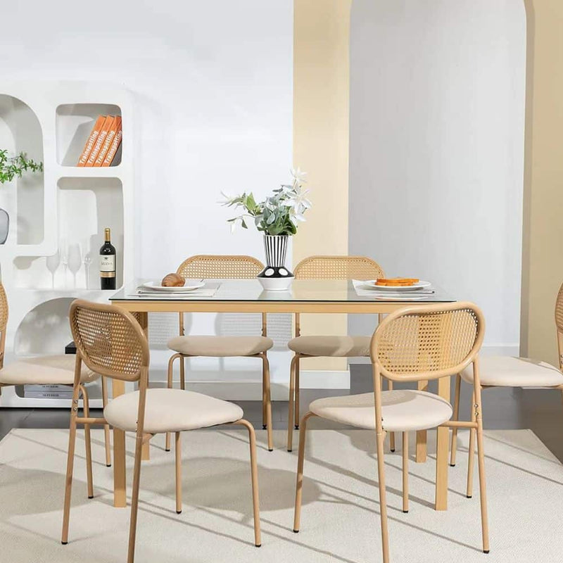 Set of two vintage-style wicker chairs with rounded backs – shown in a room setting